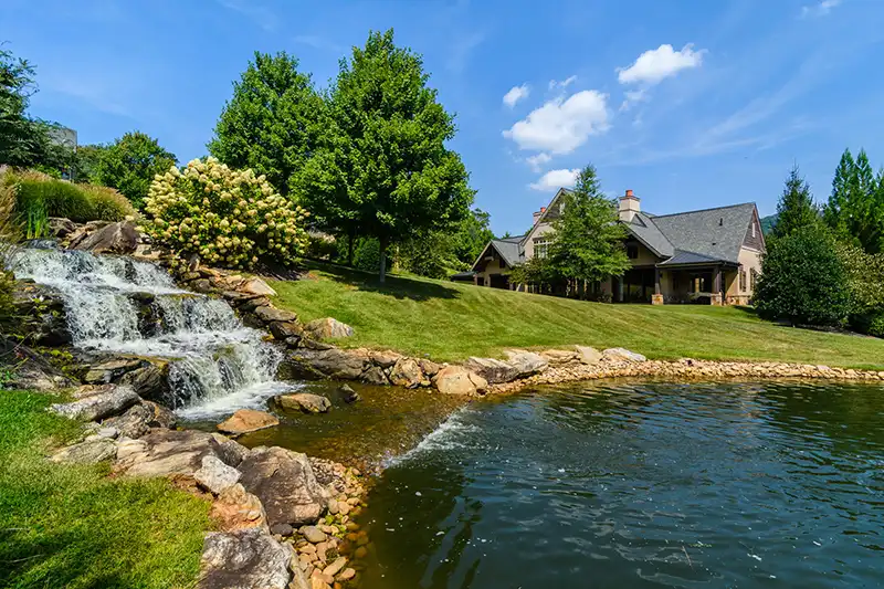 waterfall and home in The Meadow