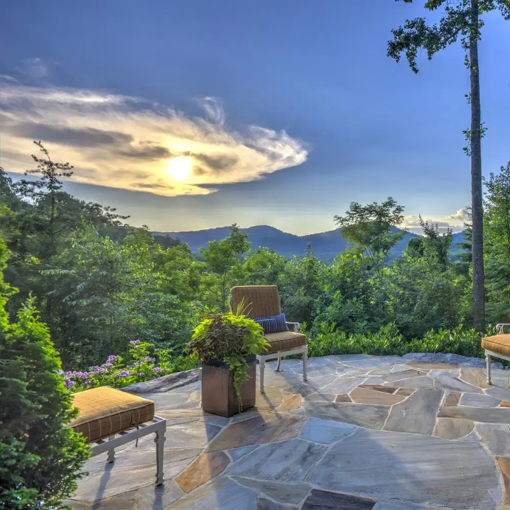 patio overlooking mountains at golden hour